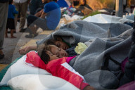Migrants flee following a fire at Moria camp in Lesvos, Greece - 11 Sept 2020