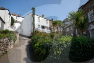 'No sex, no violence, just a laugh': mixed emotions in Cornish village as Doc Martin ends. TV series lured fans from all over the world to Port Isaac, bringing jobs and money, but critics complain it created a circus.