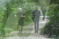 Boris Johnson running with his trainer this morning in Westminster. 