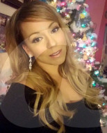 FEATURE - Lookalike: Ex-Militärpolizistin kassiert über 1500 Pfund pro Stunde als Mariah Carey Doppelgängerin