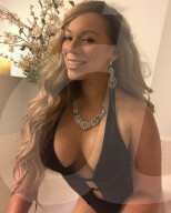FEATURE - Lookalike: Ex-Militärpolizistin kassiert über 1500 Pfund pro Stunde als Mariah Carey Doppelgängerin