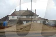 Gale-force winds blow away £20m sandscaping project in North Norfolk.