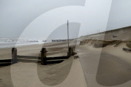 Gale-force winds blow away £20m sandscaping project in North Norfolk.