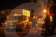 Actors encircle a car of visitors at Haunted Drive in Splendora, Texas, Sept. 25, 2020. (Brandon Thibodeaux/The New York Times)