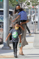 Zoe Saldana is seen running errands with two of her kids on Tuesday afternoon in Los Angeles. 