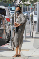Zoe Saldana is seen running errands with two of her kids on Tuesday afternoon in Los Angeles. 