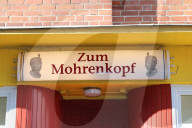 NEWS - Kieler Restaurant "Zum Mohrenkopf": Schwarzer Gastronom Andrew Onuegbu sorgt für aktuelle Debatte um rassistische Restaurantnamen