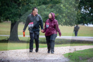 Walkers, cyclists and Marathon runners brave the wind and rain as Storm Alex continues to batter the South East today.