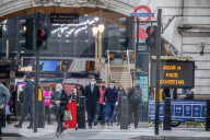 Office workers arrive in Westminster, London today as ONS figures reveal unemployment rises by a further 138,000.