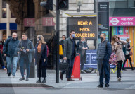 Office workers arrive in Westminster, London today as ONS figures reveal unemployment rises by a further 138,000.