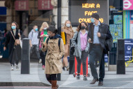 Office workers arrive in Westminster, London today as ONS figures reveal unemployment rises by a further 138,000.