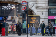 Office workers arrive in Westminster, London today as ONS figures reveal unemployment rises by a further 138,000.