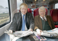 Boris Johnson and his dad Stanley Johnson on the train to Eastleigh
