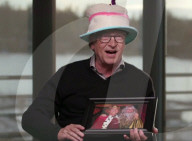Bill Gates caps TV interview by wearing his birthday hat