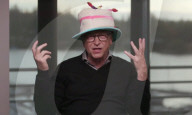 Bill Gates caps TV interview by wearing his birthday hat