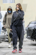 PREMIUM EXCLUSIVE Hailey Baldwin Keps Warm In Monochromatic Sweatsuit