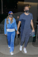 PREMIUM EXCLUSIVE Paris Hilton Dons Comfy Tracksuit For Anniversary Vacation With Carter Reum