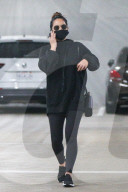 Olivia Munn, 40, is seen stopping by Whole Foods market in Los Angeles to pick up groceries.
