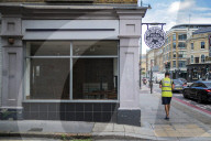 Pizza Express wipes Â£400m off the debt bill in rescue deal. Former Asda boss Allan Leighton becomes chairman of the troubled restaurant chain that has secured a restructuring deal