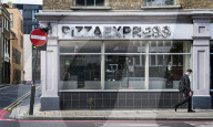 Pizza Express wipes Â£400m off the debt bill in rescue deal. Former Asda boss Allan Leighton becomes chairman of the troubled restaurant chain that has secured a restructuring deal