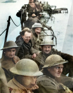 British troops on an improvised pier of motor vehicles, Dunkirk, 1940.