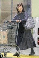 Mel GibsonÍs first wife and mother to seven of his nine kids, Robyn Moore, 60, makes a rare public appearance whilst grocery shopping in Malibu on Friday afternoon. 