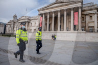 Police patrol the streets as London goes into its first day of lockdown.