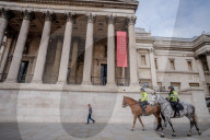 Police patrol the streets as London goes into its first day of lockdown.