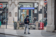 Police patrol the streets as London goes into its first day of lockdown.