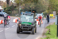 Members of the public go out for a Sunday walk and cycle in a packed Richmond Park in South West London as Police patrol the park.