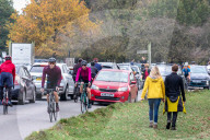 Members of the public go out for a Sunday walk and cycle in a packed Richmond Park in South West London 