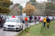 Members of the public go out for a Sunday walk and cycle in a packed Richmond Park in South West London 