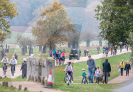 Members of the public go out for a Sunday walk and cycle in a packed Richmond Park in South West London as Police patrol the park.