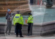 Police patrol the streets as London goes into its first day of lockdown.