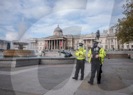Police patrol the streets as London goes into its first day of lockdown.