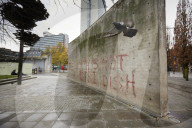 Demolition has begun on a wall in Piccadilly Gardens, Manchester, which forms part of Japanese architect Tadao Ando's only building in the UK. Removal of the six-metre-long concrete wall, which locals have dubbed the Berlin Wall, began on 16 November and 