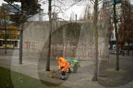 Demolition has begun on a wall in Piccadilly Gardens, Manchester, which forms part of Japanese architect Tadao Ando's only building in the UK. Removal of the six-metre-long concrete wall, which locals have dubbed the Berlin Wall, began on 16 November and 