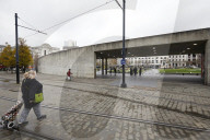 Demolition has begun on a wall in Piccadilly Gardens, Manchester, which forms part of Japanese architect Tadao Ando's only building in the UK. Removal of the six-metre-long concrete wall, which locals have dubbed the Berlin Wall, began on 16 November and 