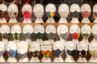 Covid lockdown two: coffee queues, traffic jams, staring at shops and boredom. On a sodden seafront in Hove, East Sussex, walkers look for respite from the latest coronavirus restrictions
