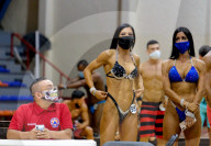 FEATURE - Fitness-Wettbewerb mit Maske in Cancun,