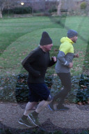 Boris Johnson jogging with his personal trainer Harry Jameson today.