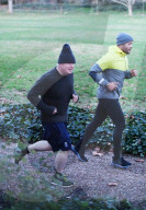 Boris Johnson jogging with his personal trainer Harry Jameson today.