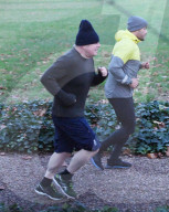 Boris Johnson jogging with his personal trainer Harry Jameson today.