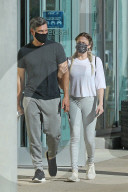 LeAnn Rimes and Eddie Cibrian look tense as they are seen holding hands whilst visiting an urgent care facility in the San Fernando Valley. 