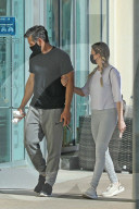 LeAnn Rimes and Eddie Cibrian look tense as they are seen holding hands whilst visiting an urgent care facility in the San Fernando Valley. 