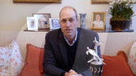 Prince William presents conservation award to a beach ranger protecting endangered turtles