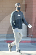 Eddie Cibrian is spotted running errands at his local post office before picking up prescriptions at a pharmacy