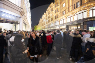 A large crowd of young people outside Harrods, Knightsbridge, London.