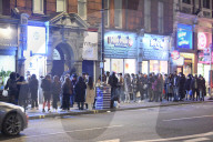 Londoners flock to bars, pubs and theatres for final night out before Tier 3 restrictions.