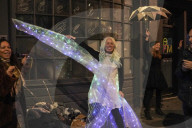Christmas revellers make the most of the last night of bars being open before London is moved to Tier 3 restrictions.